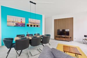 TV a/nebo společenská místnost v ubytování MARLEI 6 Apartment mit 3 Schlafzimmern, gemütlichen Wohnbereich, mit 2 WCs