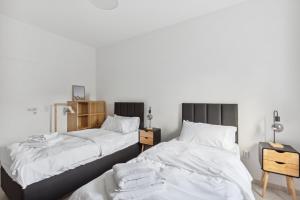 Postel nebo postele na pokoji v ubytování MARLEI 6 Apartment mit 3 Schlafzimmern, gemütlichen Wohnbereich, mit 2 WCs