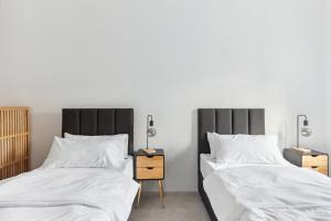 Postel nebo postele na pokoji v ubytování MARLEI 6 Apartment mit 3 Schlafzimmern, gemütlichen Wohnbereich, mit 2 WCs