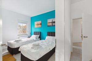 Postel nebo postele na pokoji v ubytování MARLEI 6 Apartment mit 3 Schlafzimmern, gemütlichen Wohnbereich, mit 2 WCs