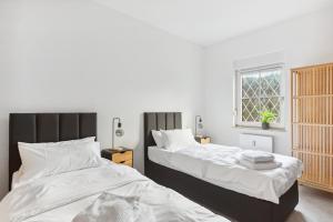 Postel nebo postele na pokoji v ubytování MARLEI 6 Apartment mit 3 Schlafzimmern, gemütlichen Wohnbereich, mit 2 WCs