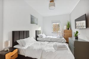 Postel nebo postele na pokoji v ubytování MARLEI 6 Apartment mit 3 Schlafzimmern, gemütlichen Wohnbereich, mit 2 WCs
