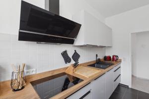 Kuchyň nebo kuchyňský kout v ubytování MARLEI 6 Apartment mit 3 Schlafzimmern, gemütlichen Wohnbereich, mit 2 WCs