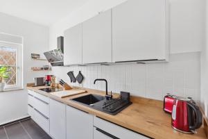 Kuchyň nebo kuchyňský kout v ubytování MARLEI 6 Apartment mit 3 Schlafzimmern, gemütlichen Wohnbereich, mit 2 WCs