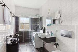 Koupelna v ubytování MARLEI 6 Apartment mit 3 Schlafzimmern, gemütlichen Wohnbereich, mit 2 WCs