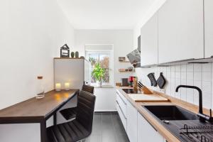 Kuchyň nebo kuchyňský kout v ubytování MARLEI 6 Apartment mit 3 Schlafzimmern, gemütlichen Wohnbereich, mit 2 WCs
