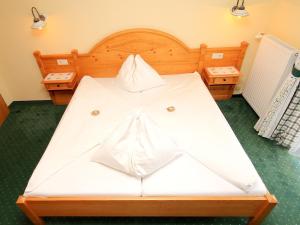 Rúm í herbergi á Hotel Kreutzer