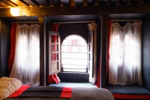 Letto o letti in una camera di Hira Guest House