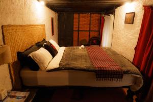 Letto o letti in una camera di Hira Guest House