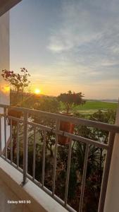 a view of the sunset from a balcony at Lak View hotel in Lien Son