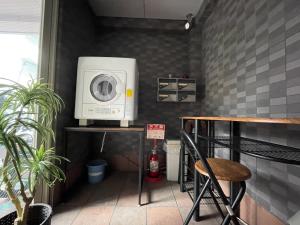 Kuchyň nebo kuchyňský kout v ubytování マルチステイ大阪京橋21