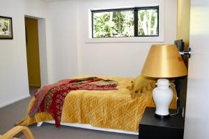 Postel nebo postele na pokoji v ubytování Melrose Down Under