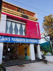 a store front of a mall with a sign on it at JP RESIDENCY in Yelagiri