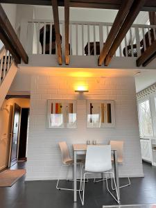 Ruang duduk di Ferienanlage Bi de Süd 43 Ferienwohnung Kajüte 2-OG