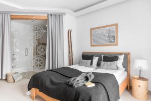 Posteľ alebo postele v izbe v ubytovaní Villa 11 Folk & Design