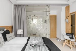 Posteľ alebo postele v izbe v ubytovaní Villa 11 Folk & Design