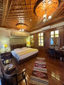 Ένα ή περισσότερα κρεβάτια σε δωμάτιο στο Tas Konak Hotel-City Center +163 φωτογραφίες