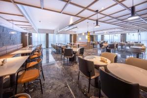 Restavracija oz. druge možnosti za prehrano v nastanitvi Atour Hotel Foshan Shunde Happy Coast