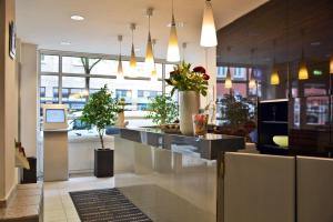 Uma TV ou centro de entretenimento em Hotel Italia