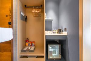 Kuchyň nebo kuchyňský kout v ubytování Atour Hotel Zhongshan Tanzhou