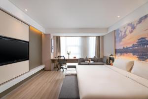 TV a/nebo společenská místnost v ubytování Atour Hotel Xi'an Daming Palace