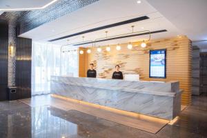 Ο χώρος του λόμπι ή της ρεσεψιόν στο Atour Hotel Shenzhen Nanshan Xili University Town
