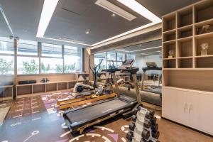 a gym with treadmills and a treadmill at Atour Hotel Hangzhou West Lake Wulin Plaza North Jianguo Road in Hangzhou