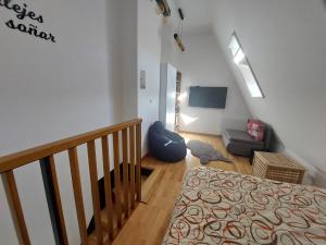 سرير أو أسرّة في غرفة في Apartman Kiara