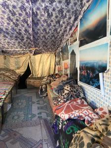 a room with two beds in a tent at Mount Moses Camp in Saint Catherine