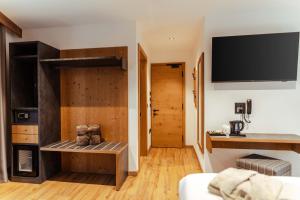 Postel nebo postele na pokoji v ubytování Hotel Villa Melì