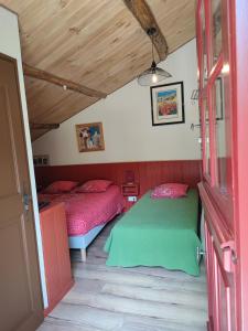 Postel nebo postele na pokoji v ubytování Le Mas De Ribard