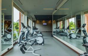 a gym with treadmills and elliptical machines at The Westin Goa in Vagator +189 photos