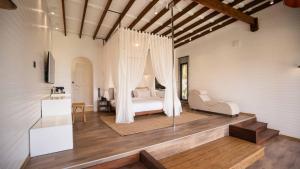 a bedroom with a bed in a room at Lov Faralya Adults Only in Faralya +37 photos