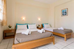 Postel nebo postele na pokoji v ubytování Laganas Holidays Hotel