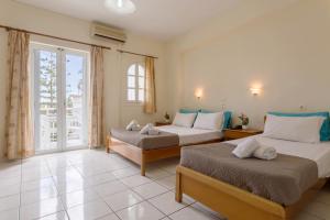 Postel nebo postele na pokoji v ubytování Laganas Holidays Hotel + 37 fotografií