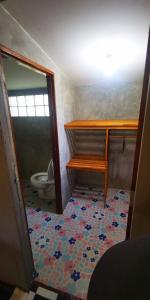 a bathroom with a sink and a toilet in a room at ปายสามหมอก in Pai