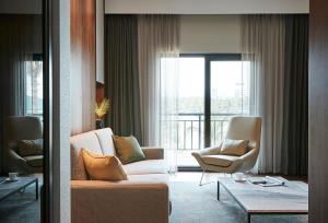Posezení v ubytování The Suites Hotel Jeju