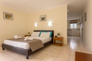 Postel nebo postele na pokoji v ubytování Laganas Holidays Hotel