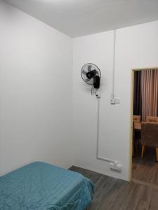 Cama o camas de una habitación en AZK HOMESTAY