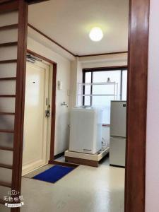 Kuchyň nebo kuchyňský kout v ubytování Cozy room in Itabashi