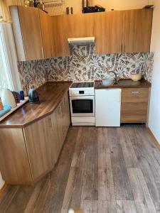 Η κουζίνα ή μικρή κουζίνα στο Dom nad jeziorem,opcja balii,duzy ogrodzony ogrod, idealne mieksce na grzyby,wedrowki,Kaszuby Nowe Czaple