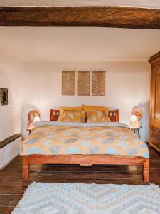 En eller flere senge i et værelse på Gemütliches Landhaus im Taunus