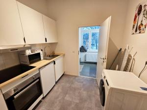 Kuchyň nebo kuchyňský kout v ubytování Nice Apartment in Wuppertal