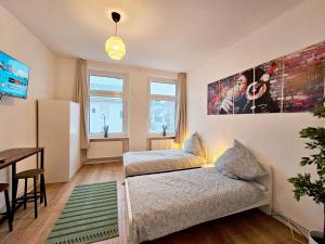Postel nebo postele na pokoji v ubytování Nice Apartment in Wuppertal