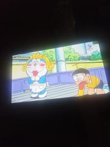 a cartoon picture of two children on a train at Caravan have TV & Netflix in Bangkok