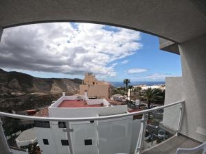 a view from the balcony of a building at Tinérfe el grande 15 in Adeje