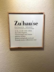 a picture of a sign on a wall at Ferienhaus am Saaler Bodden in Saal