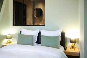 Letto o letti in una camera di Villa les érables Restaurant Linea