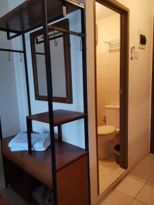 a bathroom with a bunk bed and a toilet at Pleasant05tifolia in Jakarta