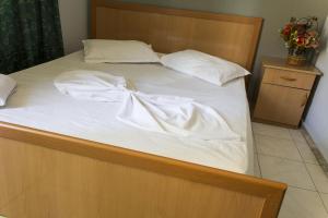 Postel nebo postele na pokoji v ubytování Hotel Central